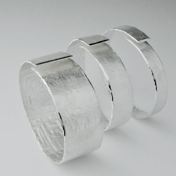 Textured silver overlap 'open' bangle