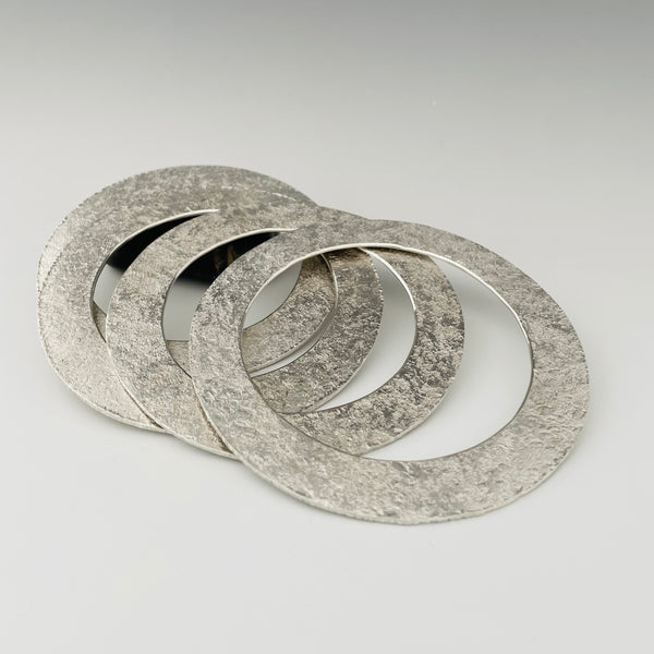 Flat 'moon' textured bangles