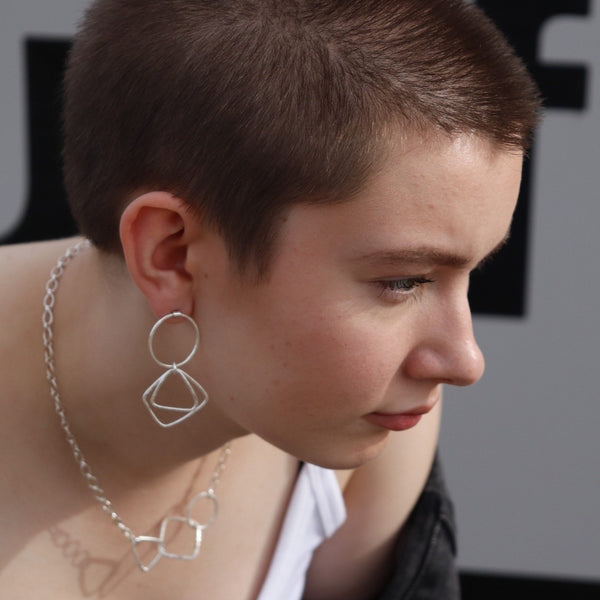 Kinetic circle, square, triangle dangly earrings