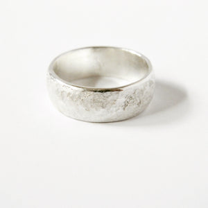 fine silver domed band with rock texture