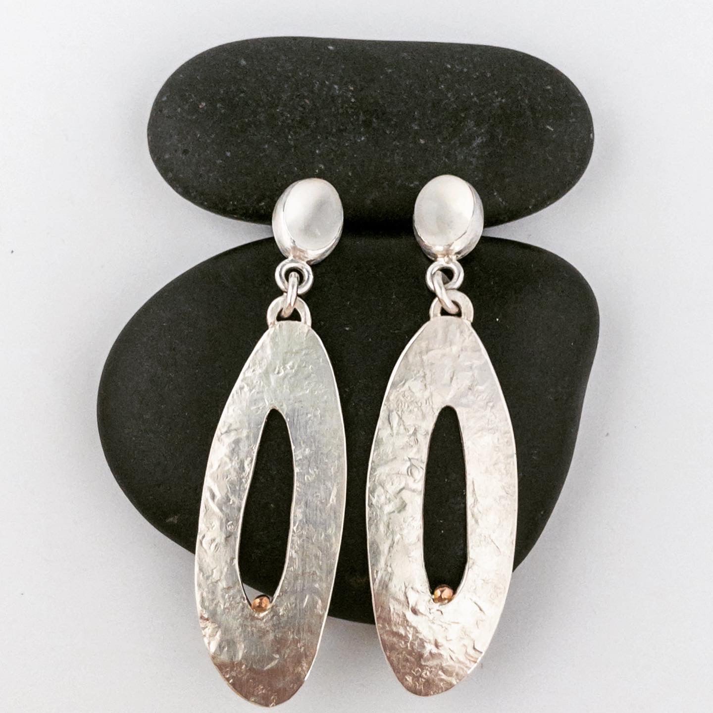 Oval moonstone earrings with gold detail