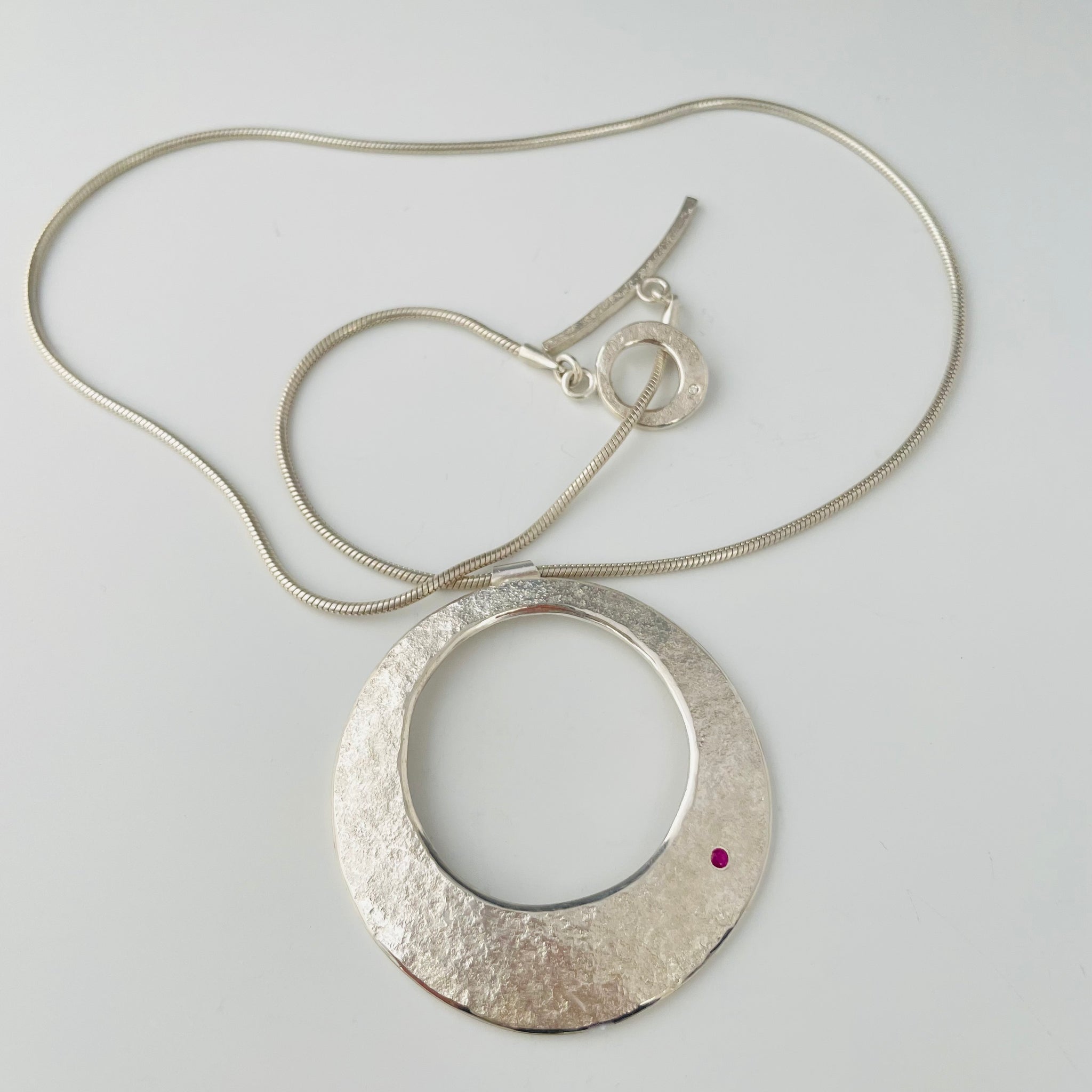 Moon/Eclipse small pendant with pink sapphire & diamond